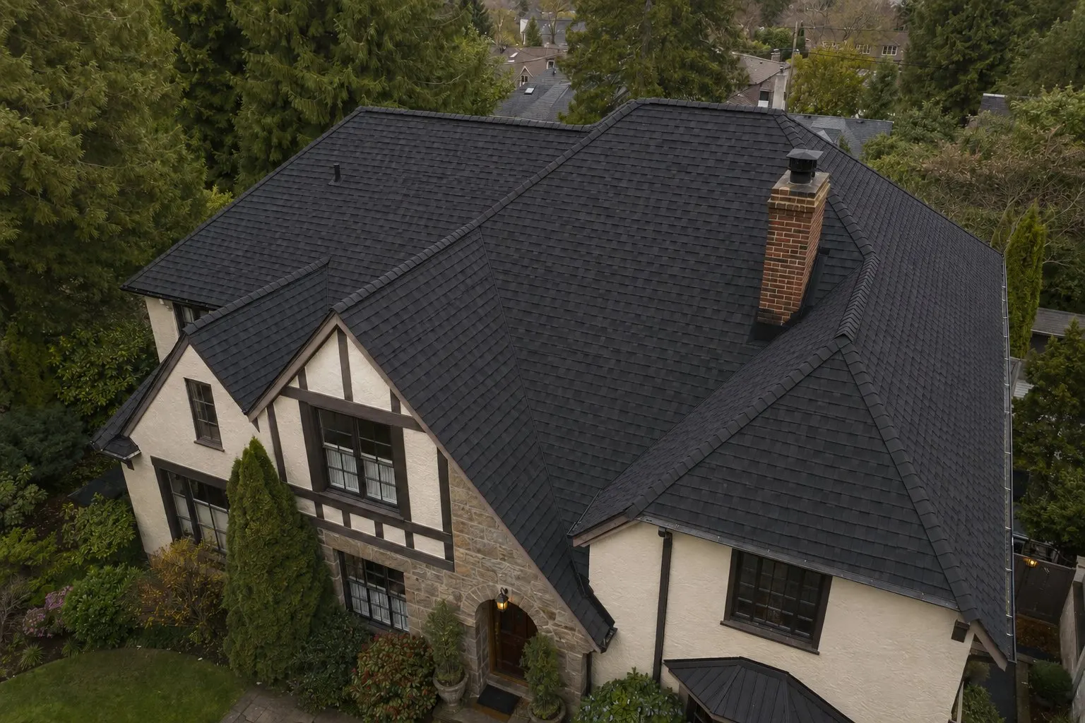Charcoal shingles & steep gables — view 2